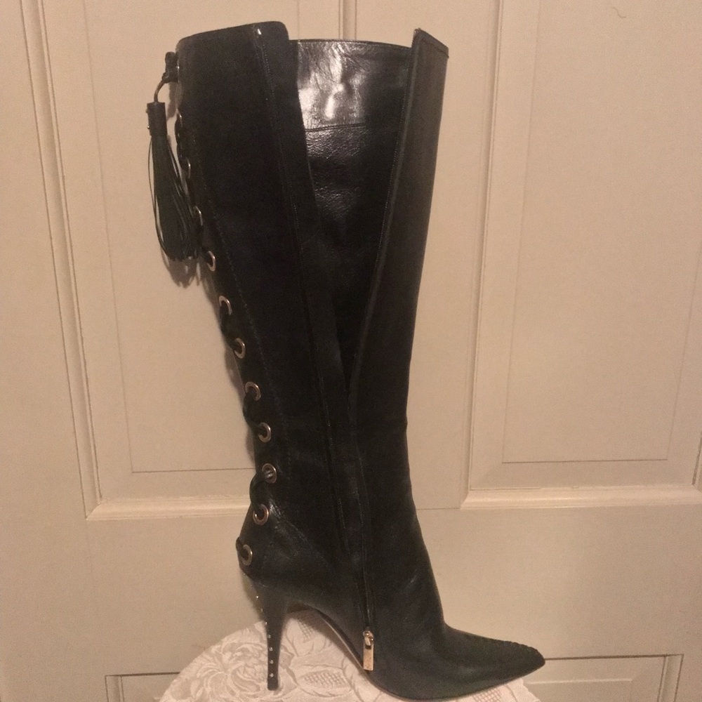 YvesSaint Laurent black knee high leather boots side zipper lace up decoration .